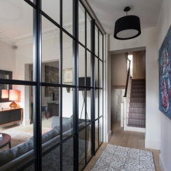 Steel industrial interior partition with glass